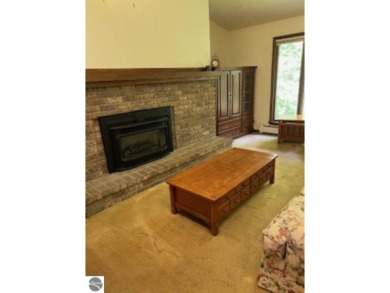 This home in the attractive Michabou Shores Subdivision is about on Crystal Downs Country Club in Michigan - for sale on GolfHomes.com, golf home, golf lot
