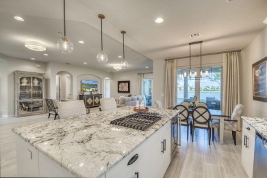 This highly upgraded carriage home in Jupiter Country Club on Jupiter Country Club in Florida - for sale on GolfHomes.com, golf home, golf lot