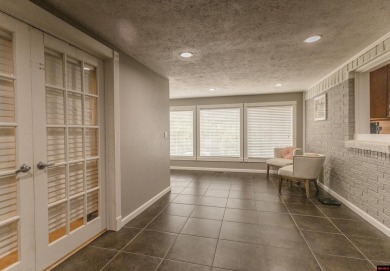 Beautifully updated 4 bedroom, 2 bathroom home in Village Green on Twin Lakes Golf Club in Arkansas - for sale on GolfHomes.com, golf home, golf lot