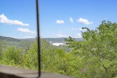 Gorgeous views from this home perched on a hilltop overlooking on Pointe Royale Village Country Club in Missouri - for sale on GolfHomes.com, golf home, golf lot