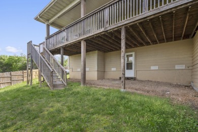Gorgeous views from this home perched on a hilltop overlooking on Pointe Royale Village Country Club in Missouri - for sale on GolfHomes.com, golf home, golf lot