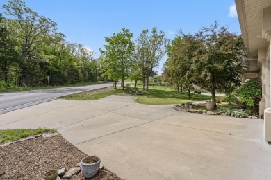 Gorgeous views from this home perched on a hilltop overlooking on Pointe Royale Village Country Club in Missouri - for sale on GolfHomes.com, golf home, golf lot