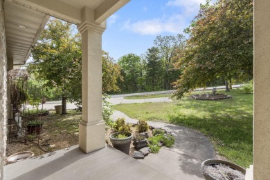 Gorgeous views from this home perched on a hilltop overlooking on Pointe Royale Village Country Club in Missouri - for sale on GolfHomes.com, golf home, golf lot