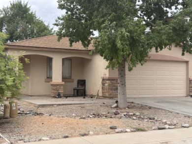 The 3 bedroom 2 bath home sits in the desirable Johnson Ranch on The Golf Club At Johnson Ranch in Arizona - for sale on GolfHomes.com, golf home, golf lot