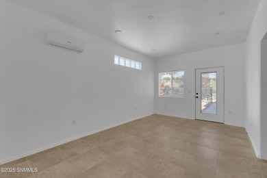 **NEW CARPET** This Solar powered home has breathtaking views of on Sonoma Ranch Golf Course in New Mexico - for sale on GolfHomes.com, golf home, golf lot