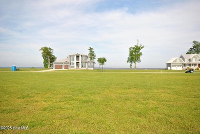 Homesite 62 is a wide flat lot offering breathtaking views of a on Occano Golf Course in North Carolina - for sale on GolfHomes.com, golf home, golf lot