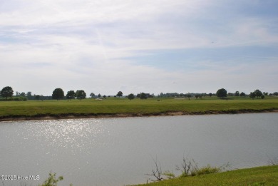 Homesite 62 is a wide flat lot offering breathtaking views of a on Occano Golf Course in North Carolina - for sale on GolfHomes.com, golf home, golf lot