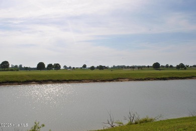 Homesite 62 is a wide flat lot offering breathtaking views of a on Occano Golf Course in North Carolina - for sale on GolfHomes.com, golf home, golf lot