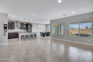 SPACIOUS  STYLISH HOME WITH LUXE FEATURES  A DREAM BACKYARD! on Poston Butte Golf Club in Arizona - for sale on GolfHomes.com, golf home, golf lot
