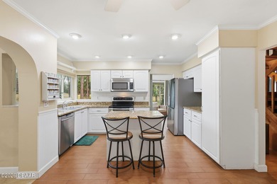 LOCATION, LOCATION, LOCATION! This spacious 4 Bedroom, 3 Bath on Indigo Lakes Golf Club in Florida - for sale on GolfHomes.com, golf home, golf lot