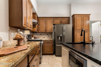 This highly sought-after Caelum Model has been beautifully on Terravita Golf and Country Club in Arizona - for sale on GolfHomes.com, golf home, golf lot