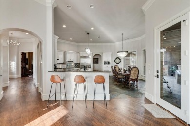 Stunning luxury home on a huge corner lot in the only 24-7 gated on The Golf Club at Resort Eagle Mountain Lake in Texas - for sale on GolfHomes.com, golf home, golf lot