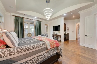 Stunning luxury home on a huge corner lot in the only 24-7 gated on The Golf Club at Resort Eagle Mountain Lake in Texas - for sale on GolfHomes.com, golf home, golf lot