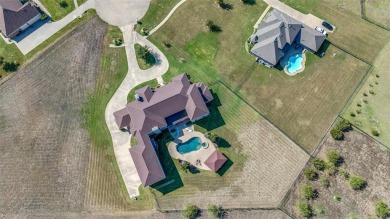 Magnificent mediterranean style home with exquisite on Tangle Ridge Golf Club in Texas - for sale on GolfHomes.com, golf home, golf lot