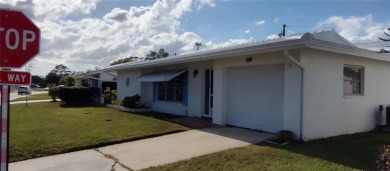 Under contract-accepting backup offers. This spacious home is on Mainlands Golf Club in Florida - for sale on GolfHomes.com, golf home, golf lot