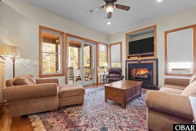 Set within the Kilmarlic Club, this thoughtfully designed on Kilmaric Golf Club in North Carolina - for sale on GolfHomes.com, golf home, golf lot