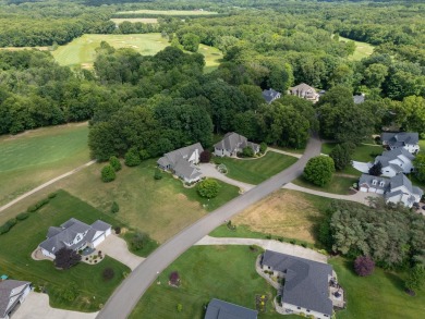 This nice and level, southern exposure, 1/2 acre lot is one of on Heritage Glen Golf Club in Michigan - for sale on GolfHomes.com, golf home, golf lot