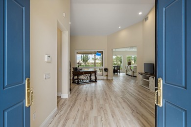 Imagine waking each morning to sunlit fairways, shimmering water on Mountain Vista Golf Course At Sun City Palm Desert in California - for sale on GolfHomes.com, golf home, golf lot