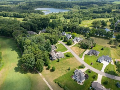 This nice and level, southern exposure, 1/2 acre lot is one of on Heritage Glen Golf Club in Michigan - for sale on GolfHomes.com, golf home, golf lot