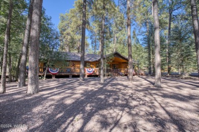 Located on the 11th tee of Pinetop Lakes Golf and Country Club on Pinetop Lakes Golf and Country Club in Arizona - for sale on GolfHomes.com, golf home, golf lot