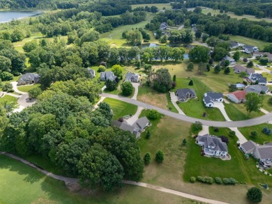 This nice and level, southern exposure, 1/2 acre lot is one of on Heritage Glen Golf Club in Michigan - for sale on GolfHomes.com, golf home, golf lot