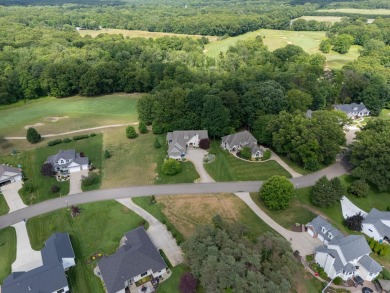This nice and level, southern exposure, 1/2 acre lot is one of on Heritage Glen Golf Club in Michigan - for sale on GolfHomes.com, golf home, golf lot