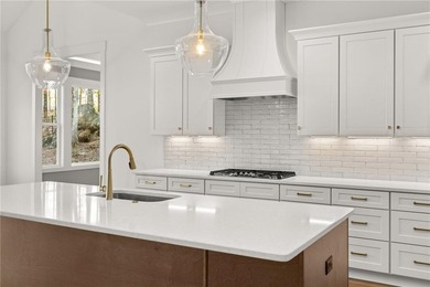 Located in the desirable Traditions of Braselton community on on Traditions of Braselton Golf Club in Georgia - for sale on GolfHomes.com, golf home, golf lot