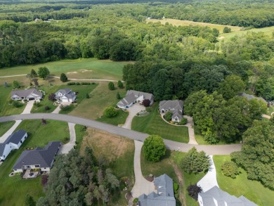 This nice and level, southern exposure, 1/2 acre lot is one of on Heritage Glen Golf Club in Michigan - for sale on GolfHomes.com, golf home, golf lot
