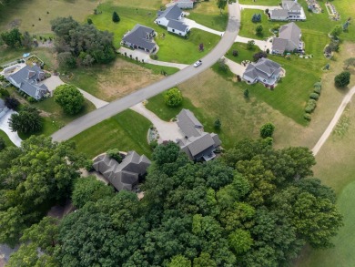 This nice and level, southern exposure, 1/2 acre lot is one of on Heritage Glen Golf Club in Michigan - for sale on GolfHomes.com, golf home, golf lot