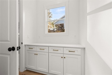 Located in the desirable Traditions of Braselton community on on Traditions of Braselton Golf Club in Georgia - for sale on GolfHomes.com, golf home, golf lot