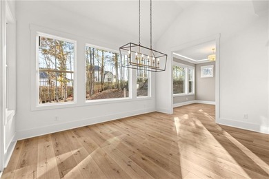 Located in the desirable Traditions of Braselton community on on Traditions of Braselton Golf Club in Georgia - for sale on GolfHomes.com, golf home, golf lot