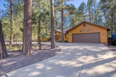 Located on the 11th tee of Pinetop Lakes Golf and Country Club on Pinetop Lakes Golf and Country Club in Arizona - for sale on GolfHomes.com, golf home, golf lot