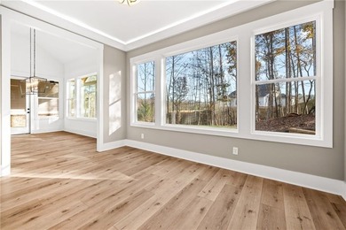 Located in the desirable Traditions of Braselton community on on Traditions of Braselton Golf Club in Georgia - for sale on GolfHomes.com, golf home, golf lot