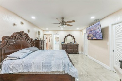 Welcome to your dream home! This stunning 3-bedroom, 2-bath on Woodlands Country Club in Florida - for sale on GolfHomes.com, golf home, golf lot
