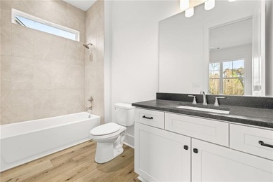 Located in the desirable Traditions of Braselton community on on Traditions of Braselton Golf Club in Georgia - for sale on GolfHomes.com, golf home, golf lot