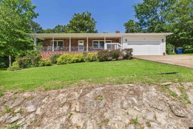 Discover this beautifully remodeled home just one minute from on Big Creek Golf and Country Club in Arkansas - for sale on GolfHomes.com, golf home, golf lot