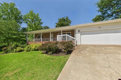 Discover this beautifully remodeled home just one minute from on Big Creek Golf and Country Club in Arkansas - for sale on GolfHomes.com, golf home, golf lot