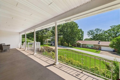 Discover this beautifully remodeled home just one minute from on Big Creek Golf and Country Club in Arkansas - for sale on GolfHomes.com, golf home, golf lot