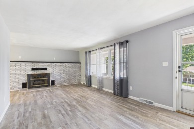 Discover this beautifully remodeled home just one minute from on Big Creek Golf and Country Club in Arkansas - for sale on GolfHomes.com, golf home, golf lot