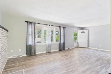 Discover this beautifully remodeled home just one minute from on Big Creek Golf and Country Club in Arkansas - for sale on GolfHomes.com, golf home, golf lot