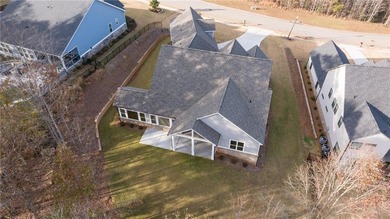 Located in the desirable Traditions of Braselton community on on Traditions of Braselton Golf Club in Georgia - for sale on GolfHomes.com, golf home, golf lot