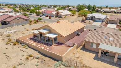 MOTIVATED SELLER! Located in the desirable no-HOA Desert Lakes on Desert Lakes Golf Course in Arizona - for sale on GolfHomes.com, golf home, golf lot