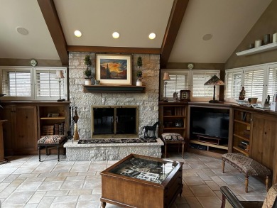 Large Living Room with gas fireplace and Large windows to enjoy on Geneva Golf Club in Illinois - for sale on GolfHomes.com, golf home, golf lot