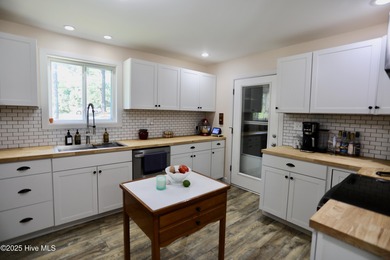 Excellent price on updated golf front beauty! Located just on Seven Lakes Country Club in North Carolina - for sale on GolfHomes.com, golf home, golf lot