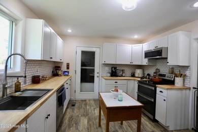 Excellent price on updated golf front beauty! Located just on Seven Lakes Country Club in North Carolina - for sale on GolfHomes.com, golf home, golf lot