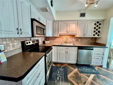 Move into this 2 bed/2 bath, turnkey-furnished condo, located on On Top Of The World Golf Course in Florida - for sale on GolfHomes.com, golf home, golf lot