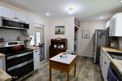 Excellent price on updated golf front beauty! Located just on Seven Lakes Country Club in North Carolina - for sale on GolfHomes.com, golf home, golf lot