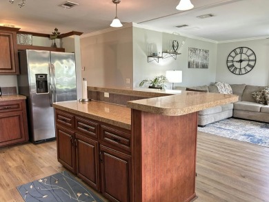 Like-new 2-bedroom, 2-bathroom home in a peaceful 55+ community on Fairways Country Club in Florida - for sale on GolfHomes.com, golf home, golf lot