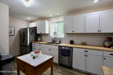 Excellent price on updated golf front beauty! Located just on Seven Lakes Country Club in North Carolina - for sale on GolfHomes.com, golf home, golf lot