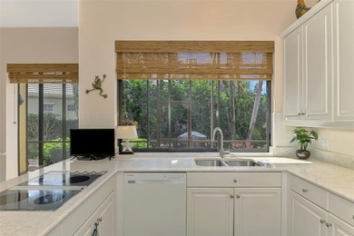 BEAUTIFUL HOME with POND and GOLF COURSE VIEWS! Situated on a on Boca Royale Golf and Country Club in Florida - for sale on GolfHomes.com, golf home, golf lot